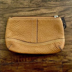 Small brown leather Coach purse.